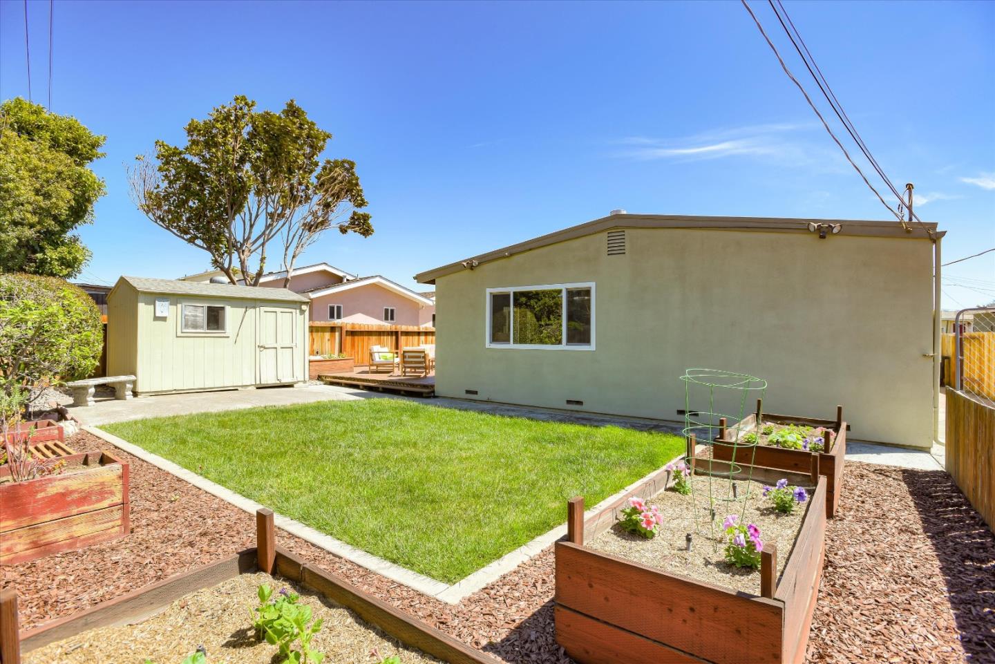 1619 Echo Avenue San Mateo, CA 94401 - Photo 33 of 34 a front view of a house with garden