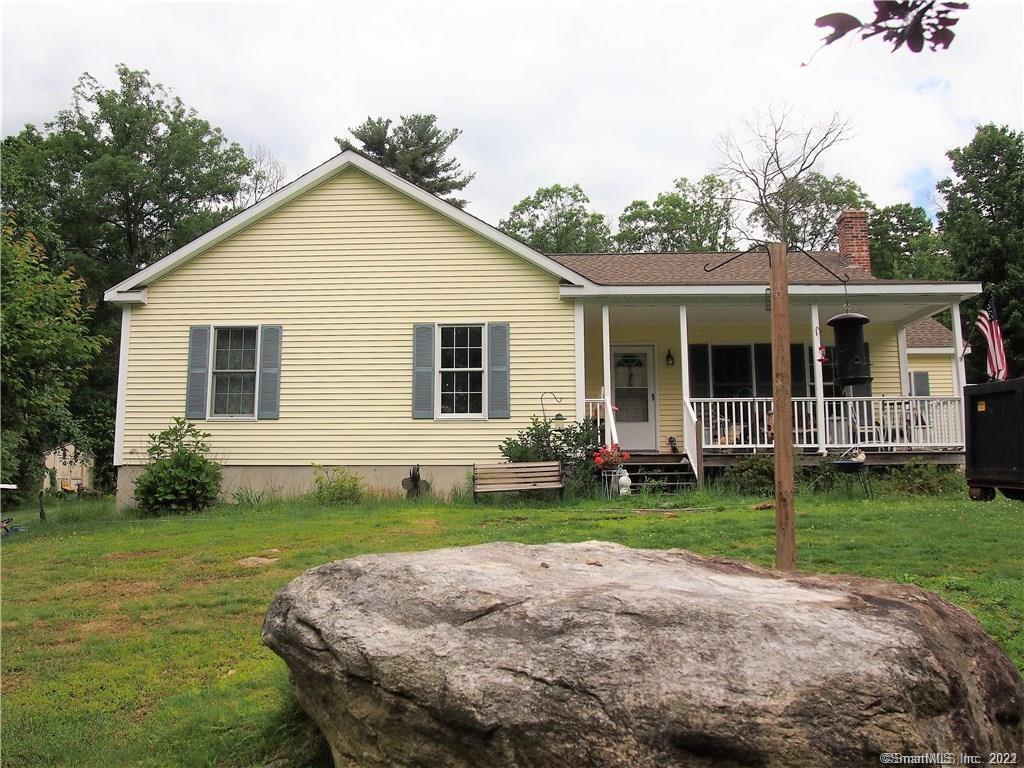 47 Nyberg Road Chaplin, CT 06235 - Photo 1 of 1 a view of a house with yard and tree s