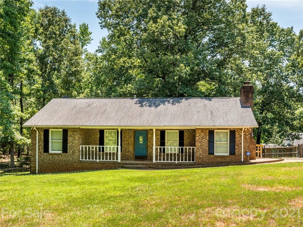 513 West Rebound Road Lancaster, SC 29720 - Photo 1 of 31 a front view of a house with a garden