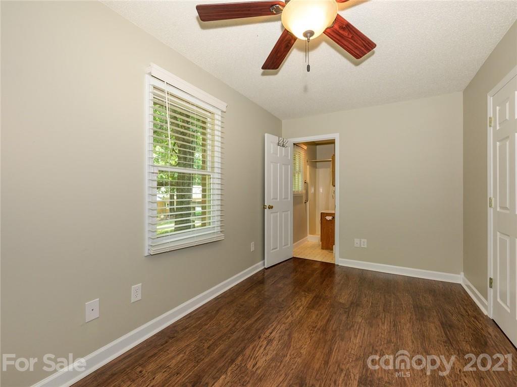 513 West Rebound Road Lancaster, SC 29720 - Photo 17 of 31 a view of an empty room with wooden floor and a window
