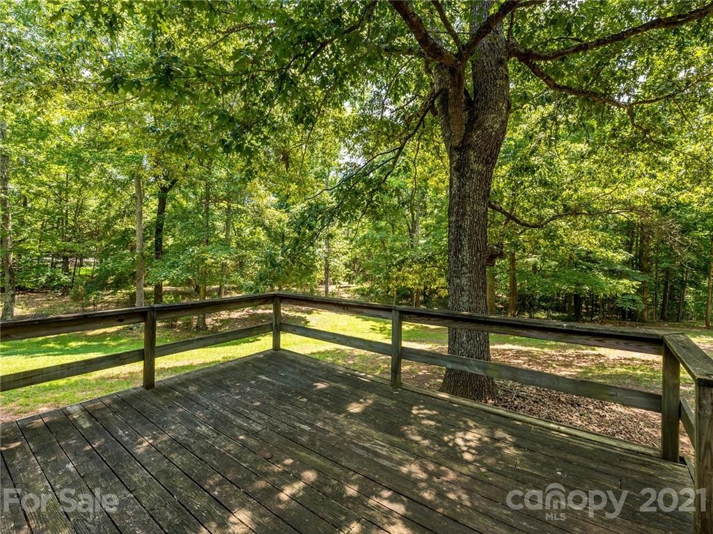 513 West Rebound Road Lancaster, SC 29720 - Photo 22 of 31 a view of sitting area with large trees