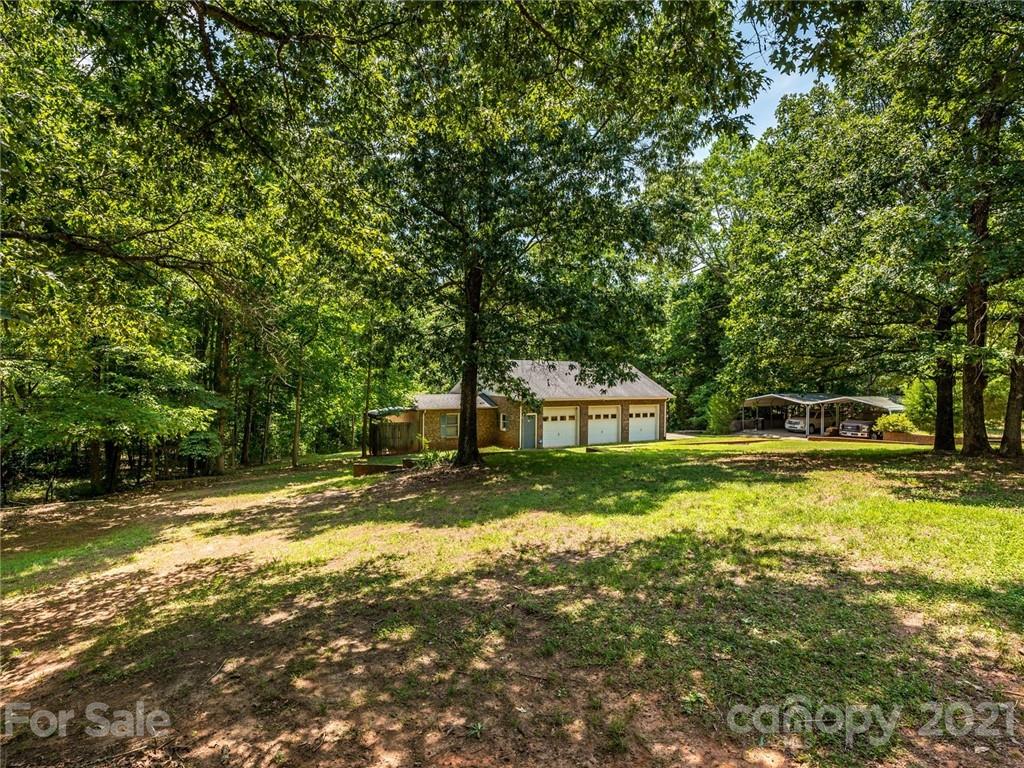 513 West Rebound Road Lancaster, SC 29720 - Photo 24 of 31 a view of a house with a yard
