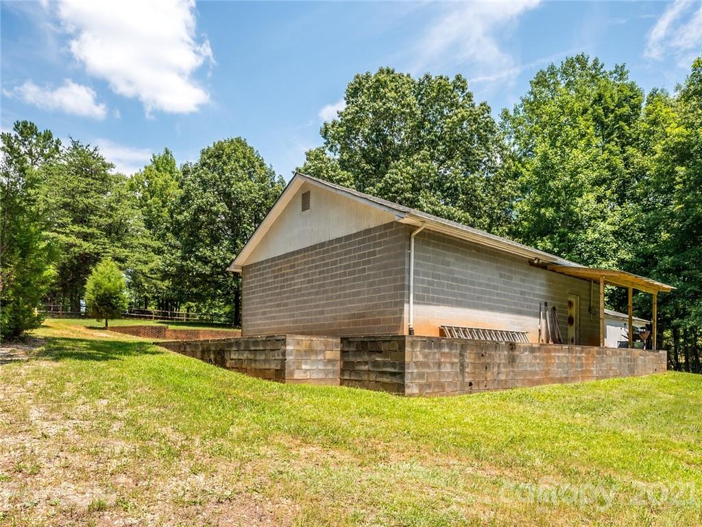 513 West Rebound Road Lancaster, SC 29720 - Photo 28 of 31 a house view with a garden space