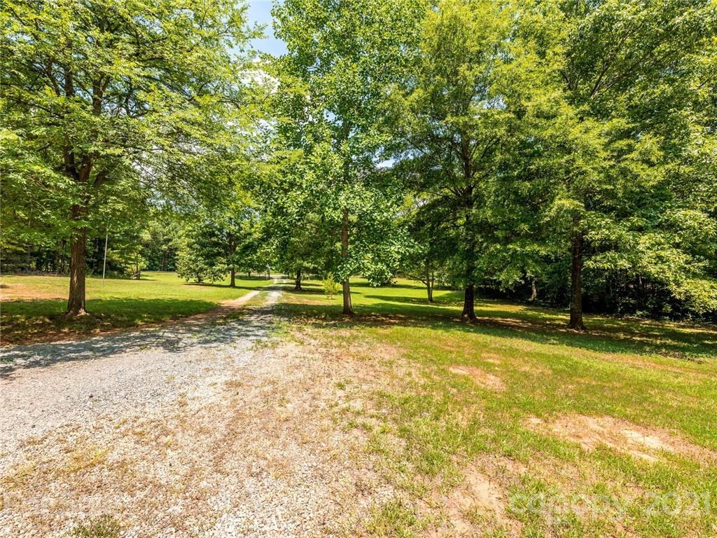 513 West Rebound Road Lancaster, SC 29720 - Photo 30 of 31 a view of a yard with a trees