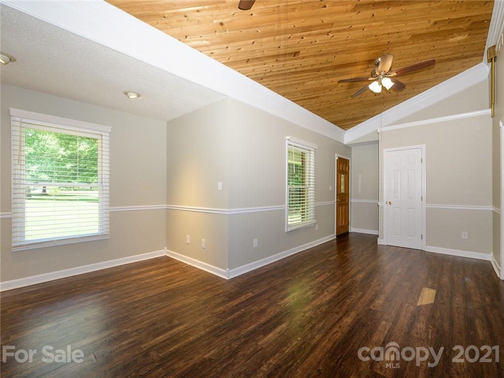 513 West Rebound Road Lancaster, SC 29720 - Photo 6 of 31 a view of a livingroom with wooden floor