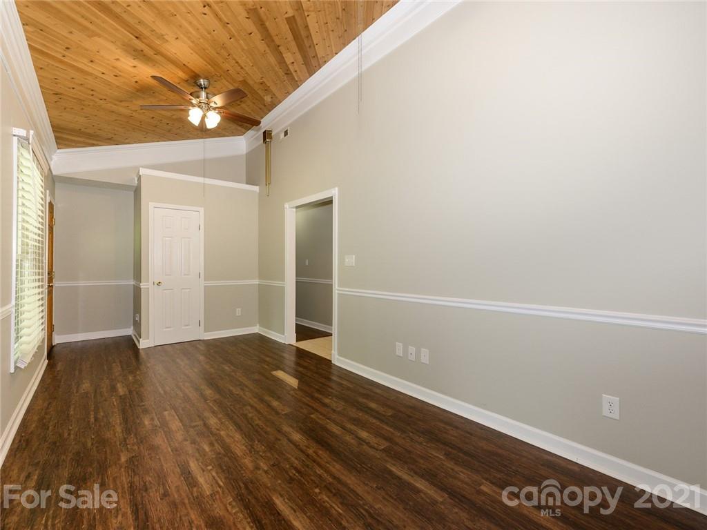 513 West Rebound Road Lancaster, SC 29720 - Photo 7 of 31 a view of an empty room with wooden floor