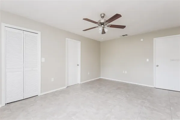 a view of a room with a fan