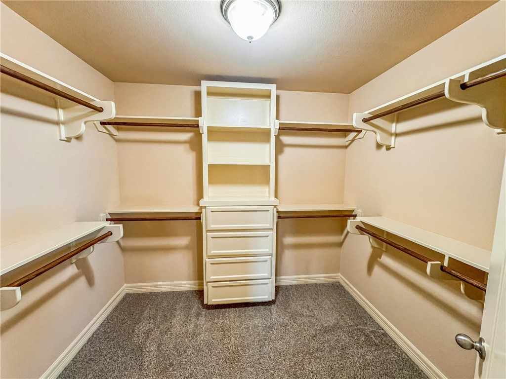 1832 Bay Landing Drive Portland, TX 78374 - Photo 22 of 29 a view of walk in closet with empty racks