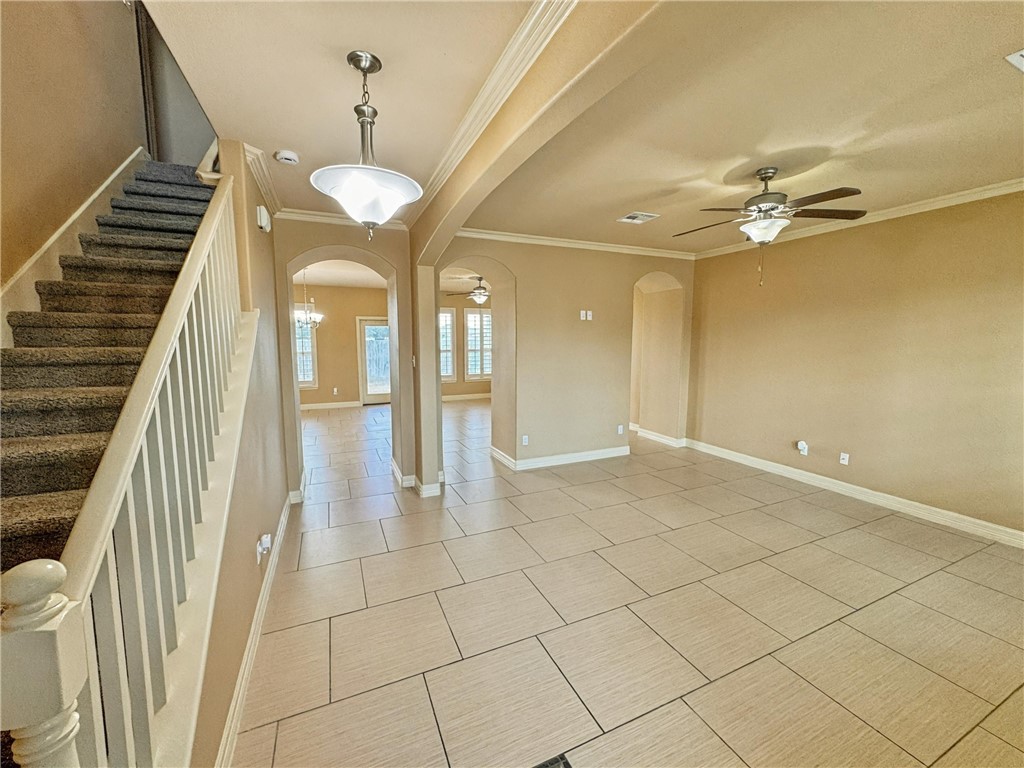 1832 Bay Landing Drive Portland, TX 78374 - Photo 3 of 29 a view of an entryway with wooden floor and a chandelier