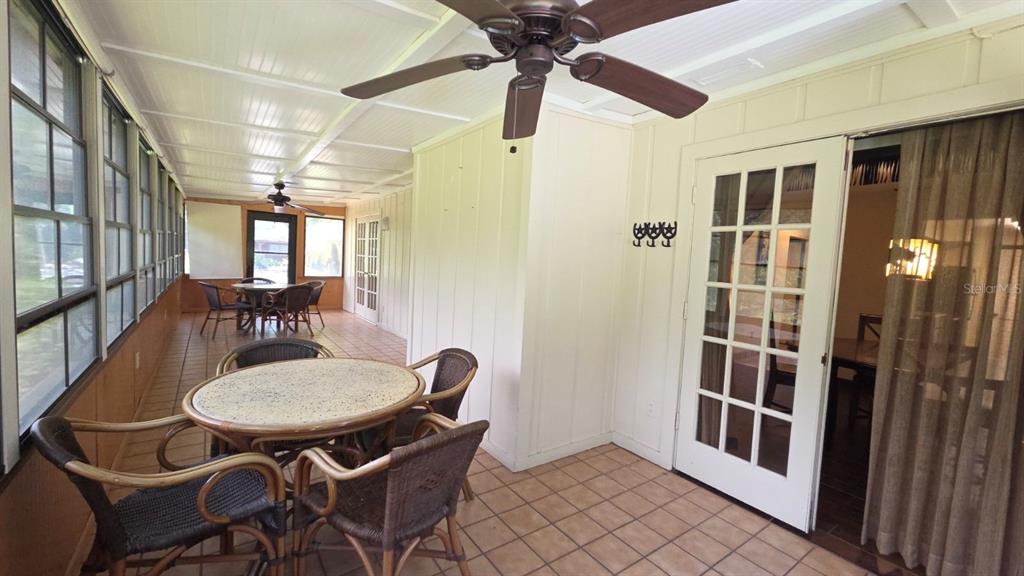 454 Cottage Circle, Unit 454 River Ranch, FL 33867 - Photo 24 of 27 a dining room with furniture and window
