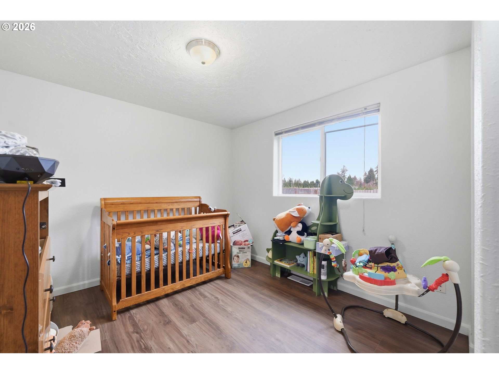 87851 Cedar Flat Road Springfield, OR 97478 - Photo 12 of 23 a bedroom with furniture and a baby crib