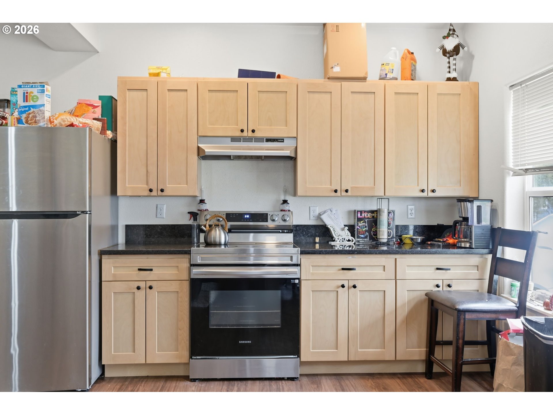 87851 Cedar Flat Road Springfield, OR 97478 - Photo 14 of 23 a kitchen with stainless steel appliances a stove a refrigerator and cabinets