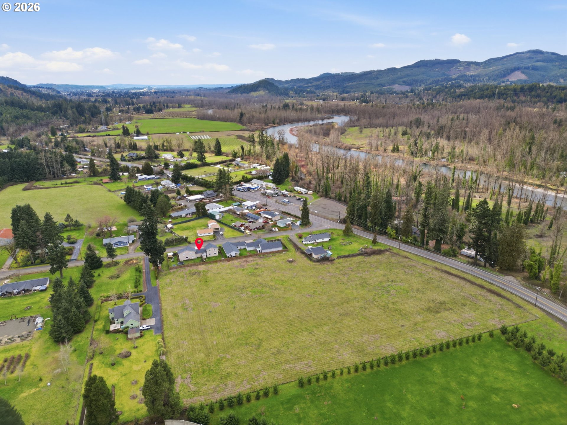 87851 Cedar Flat Road Springfield, OR 97478 - Photo 21 of 23 a view of a lake with a mountain in the background
