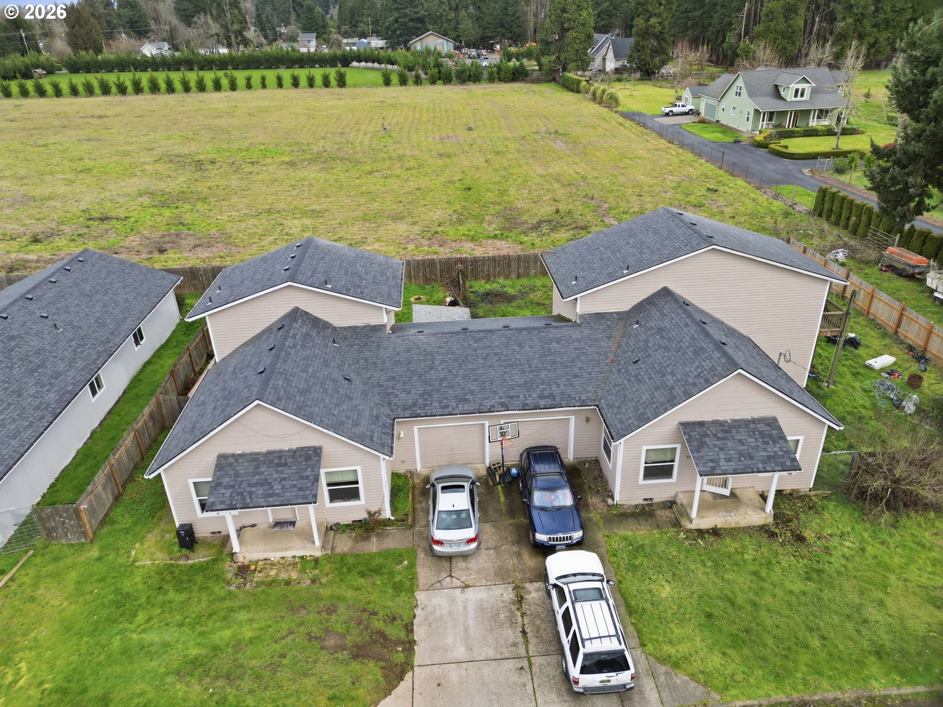 87851 Cedar Flat Road Springfield, OR 97478 - Photo 22 of 23 an aerial view of a house with a garden and lake view
