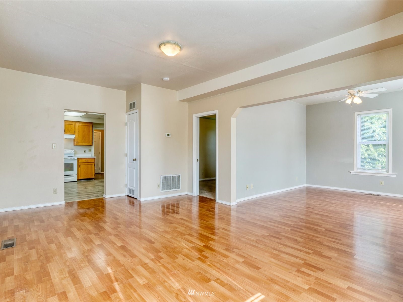 97 Logan Avenue South Renton, WA 98057 - Photo 2 of 32 a view of an empty room and window