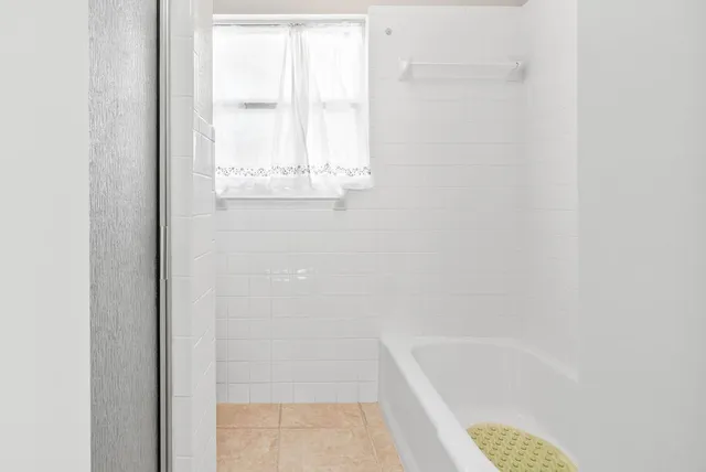 a bathroom with a bathtub