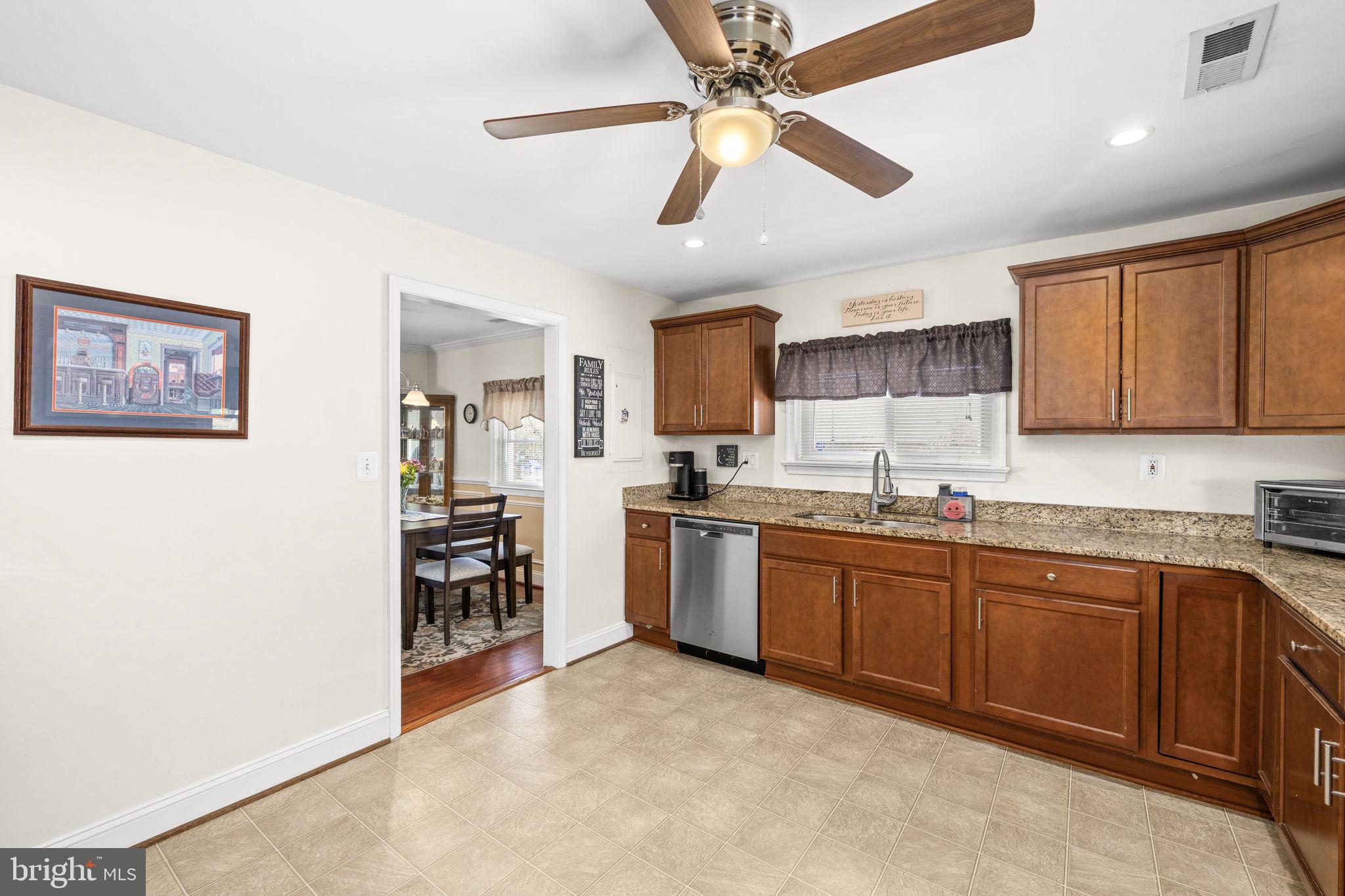 66 Kelley Road Fredericksburg, VA 22405 - Photo 15 of 35 a kitchen with a sink stainless steel appliances and cabinets
