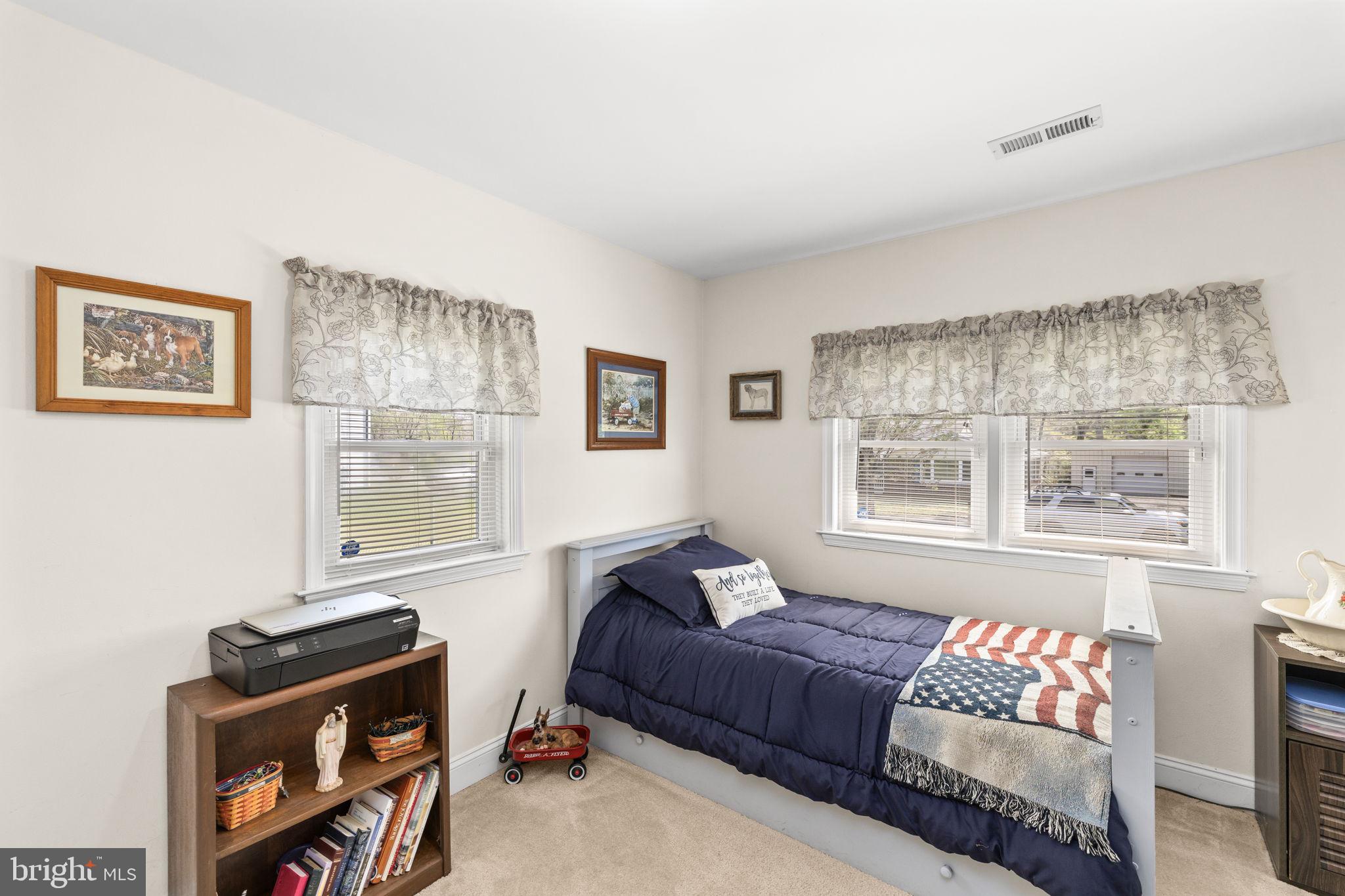 66 Kelley Road Fredericksburg, VA 22405 - Photo 19 of 35 a bedroom with a bed and a window