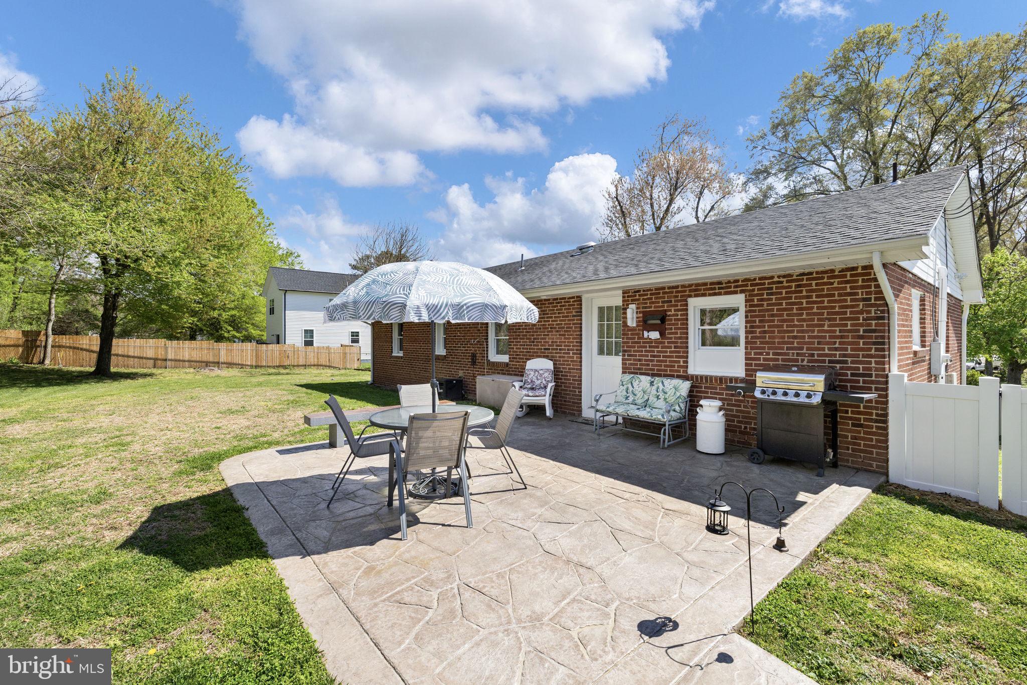 66 Kelley Road Fredericksburg, VA 22405 - Photo 24 of 35 a view of a house with backyard porch and sitting area