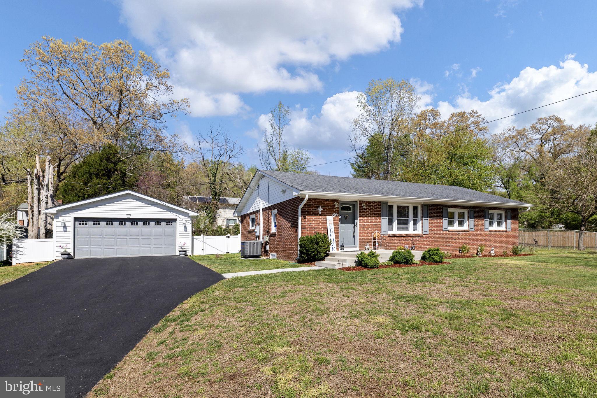 66 Kelley Road Fredericksburg, VA 22405 - Photo 34 of 35 a front view of a house with a yard