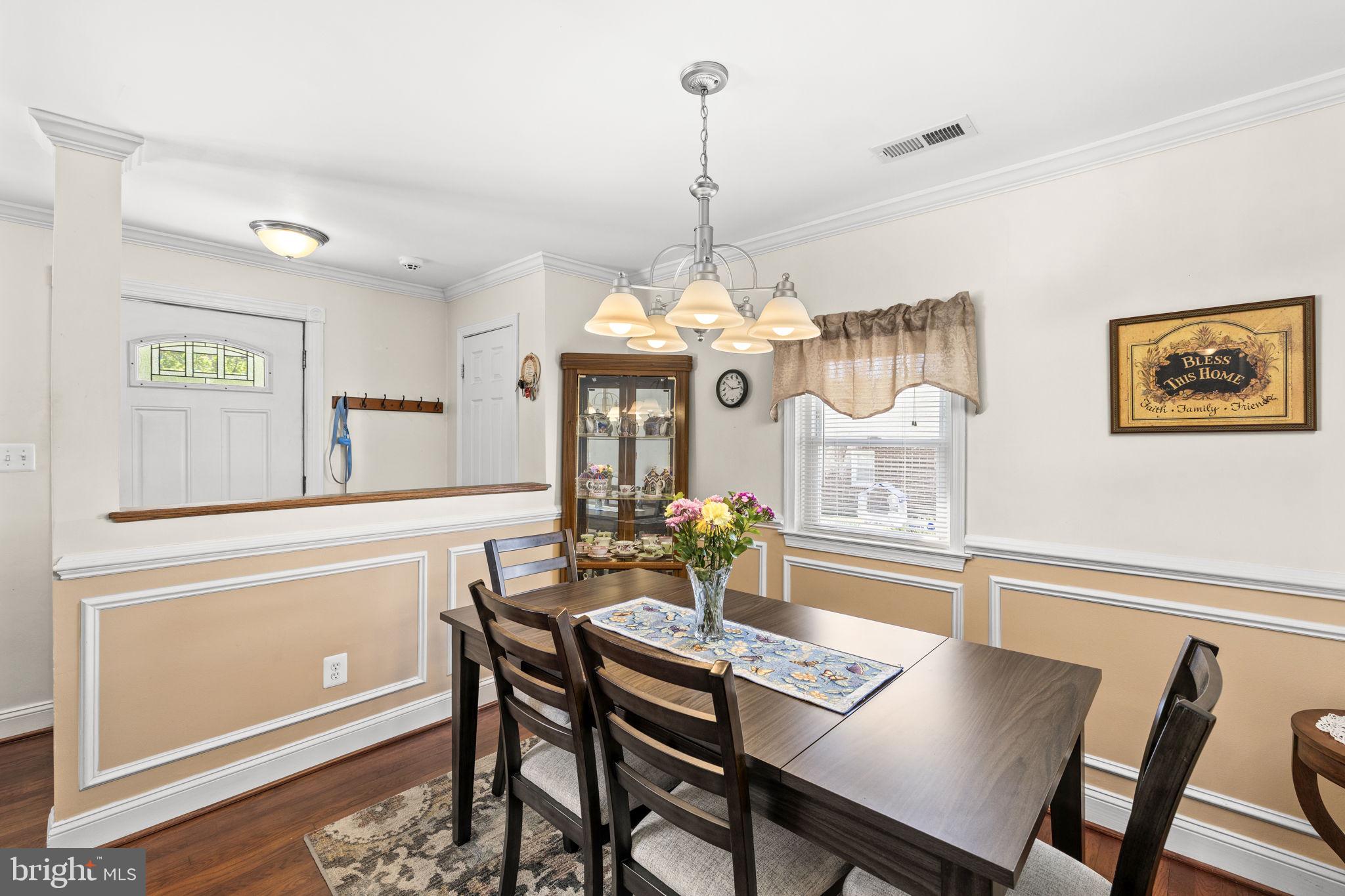 66 Kelley Road Fredericksburg, VA 22405 - Photo 4 of 35 a view of a dining room with furniture window and wooden floor