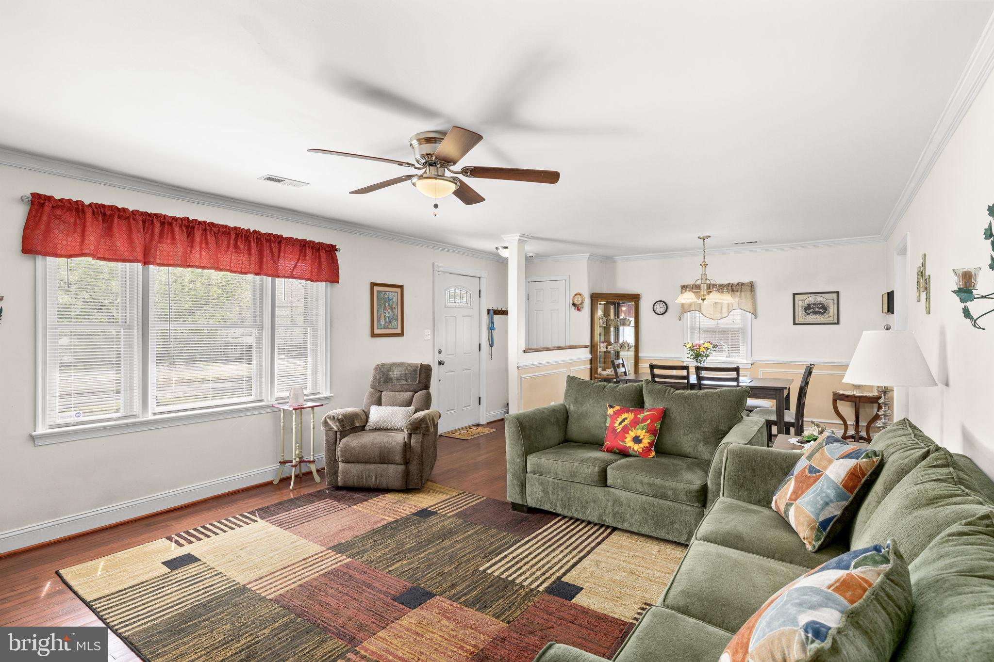 66 Kelley Road Fredericksburg, VA 22405 - Photo 5 of 35 a living room with furniture ceiling fan and a window