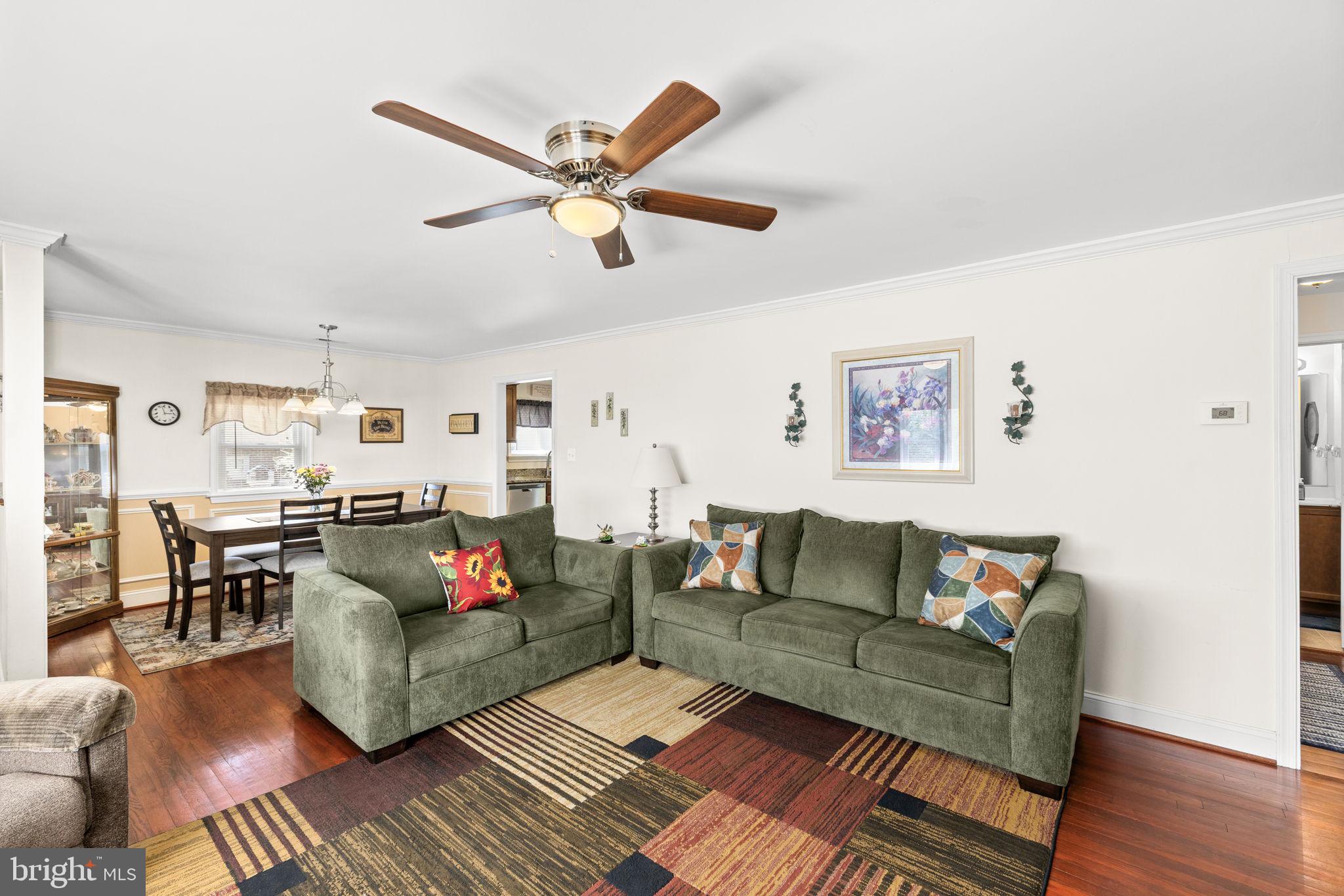 66 Kelley Road Fredericksburg, VA 22405 - Photo 6 of 35 a living room with furniture and a wooden floor