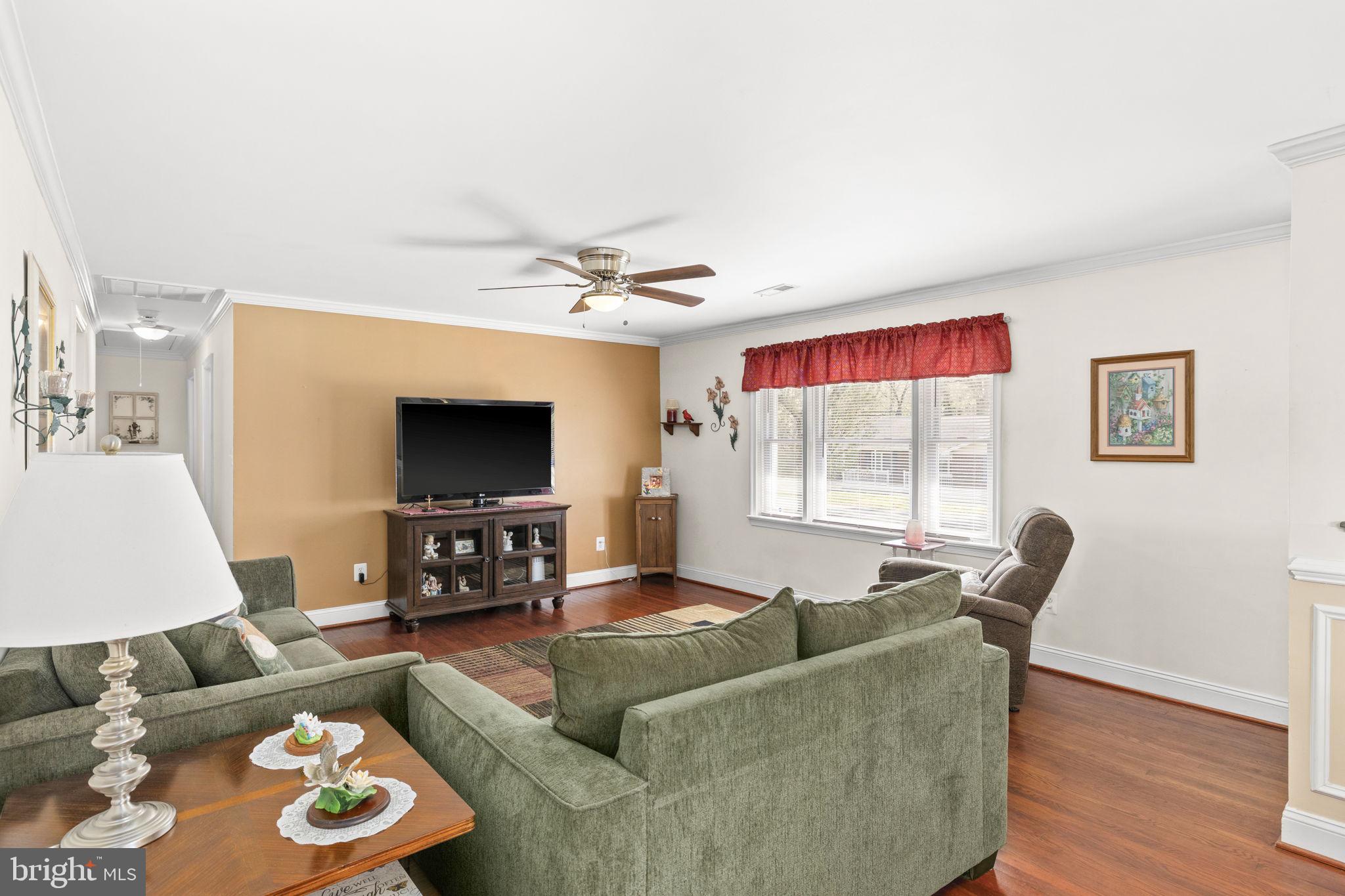 66 Kelley Road Fredericksburg, VA 22405 - Photo 8 of 35 a living room with furniture and a flat screen tv