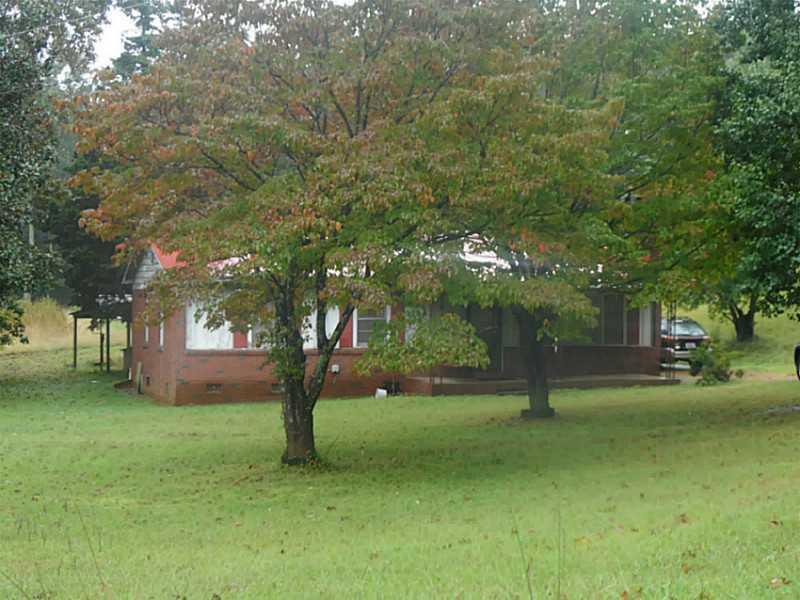 594 Roscoe Collette Road Dawsonville, GA 30534 - Photo 1 of 1 Exterior Front. BRICK AND FRAME HOME,NICE LEVEL PROPERTY!