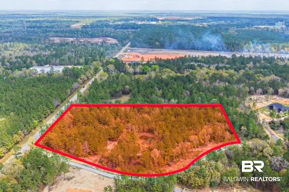 0 Salco Road Axis, AL 36505 - Photo 2 of 24 Aerial view of property's location featuring a heavily wooded area and property boundaries highlighted