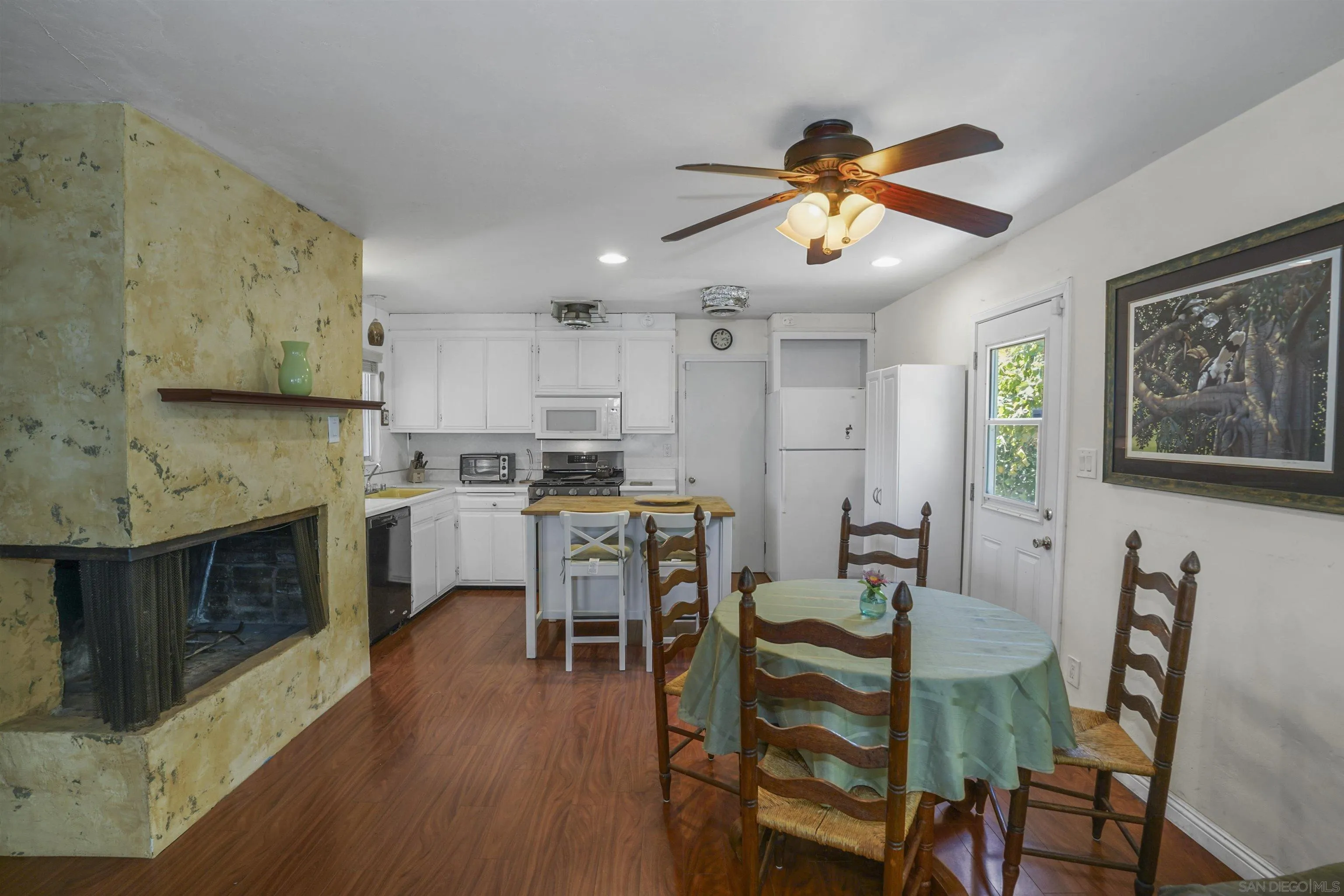5785 Jackson Drive La Mesa, CA 91942 - Photo 9 of 20 a view of kitchen with cabinets and wooden floor