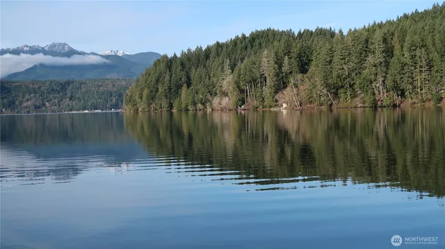 a view of a water with a building in the background