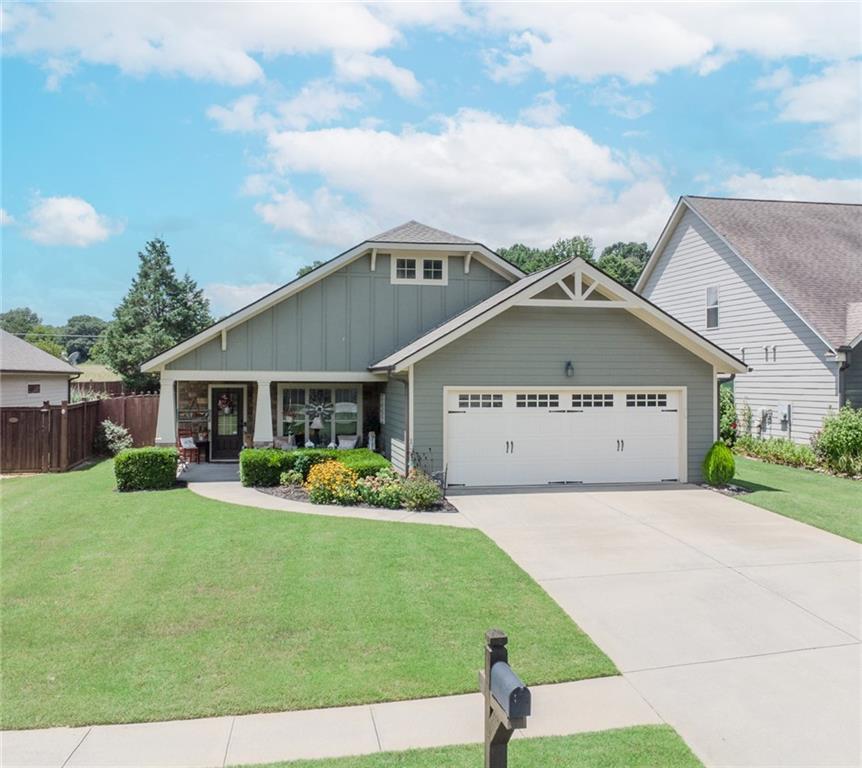 a house view with a garden space