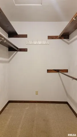 a view of a room with racks on the wall