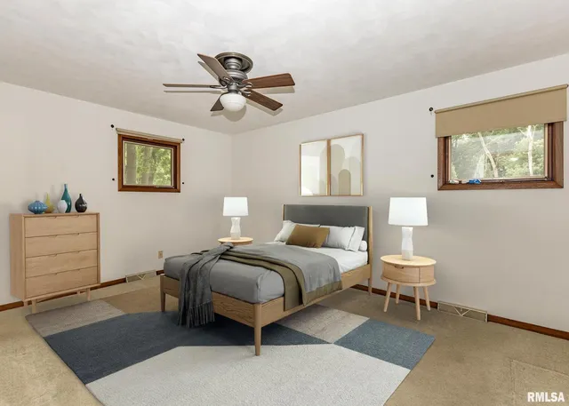 a bedroom with a bed and furniture