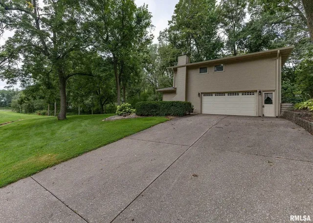 a house view with a garden space