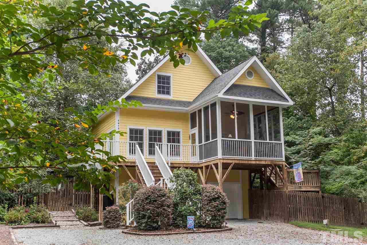 1413 Rosedale Avenue Durham, NC 27707 - Photo 1 of 25 Nestled in a private, natural setting, within close proximity to all desired urban amenities.