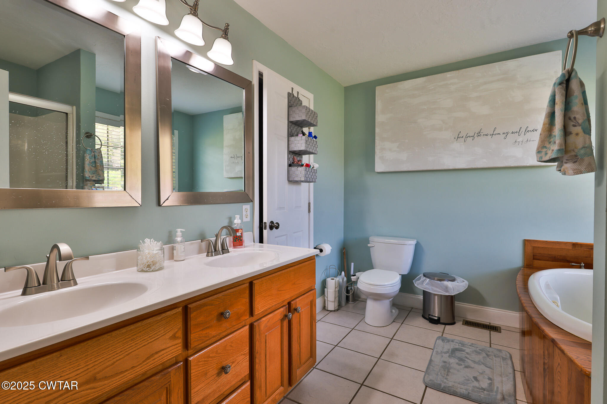 141 Oak Street Martin, TN 38237 - Photo 21 of 30 a bathroom with a toilet sink and mirror