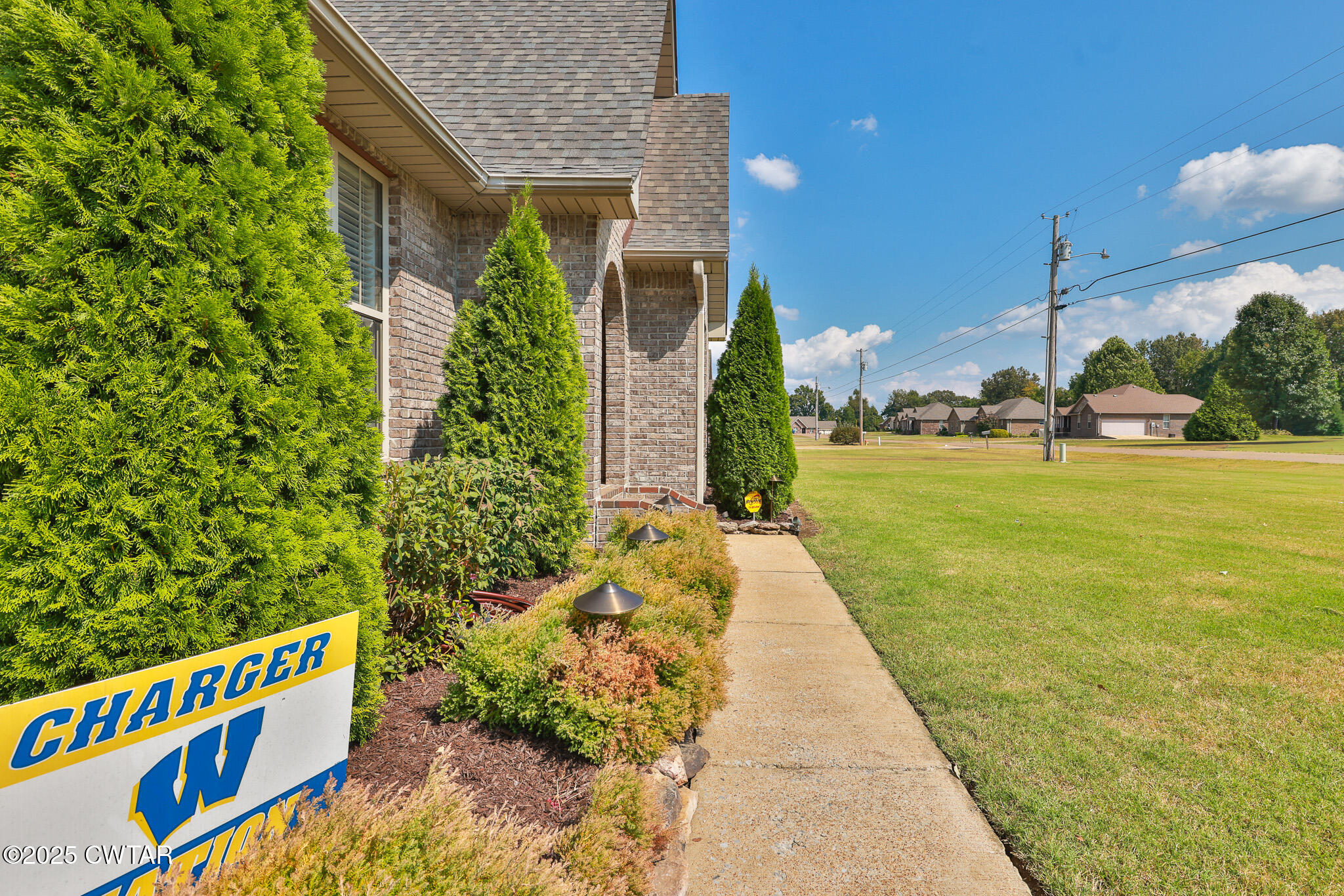 141 Oak Street Martin, TN 38237 - Photo 28 of 30 a view of an house with backyard and garden