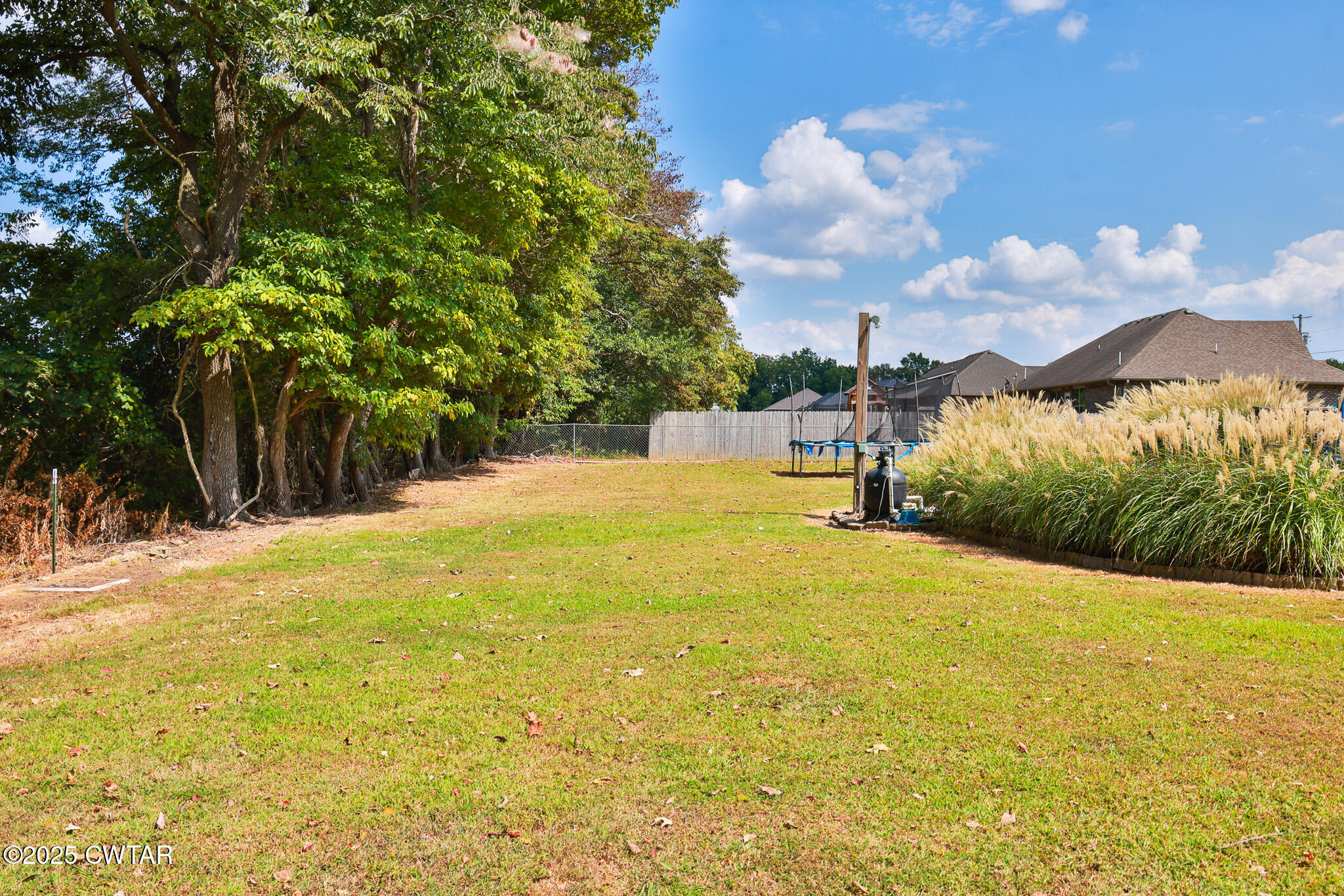 141 Oak Street Martin, TN 38237 - Photo 7 of 30 a view of swimming pool with an outdoor space and seating area