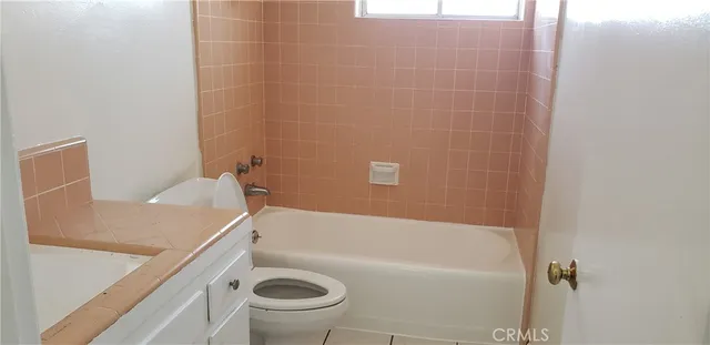 a bathroom with a sink and a bathtub
