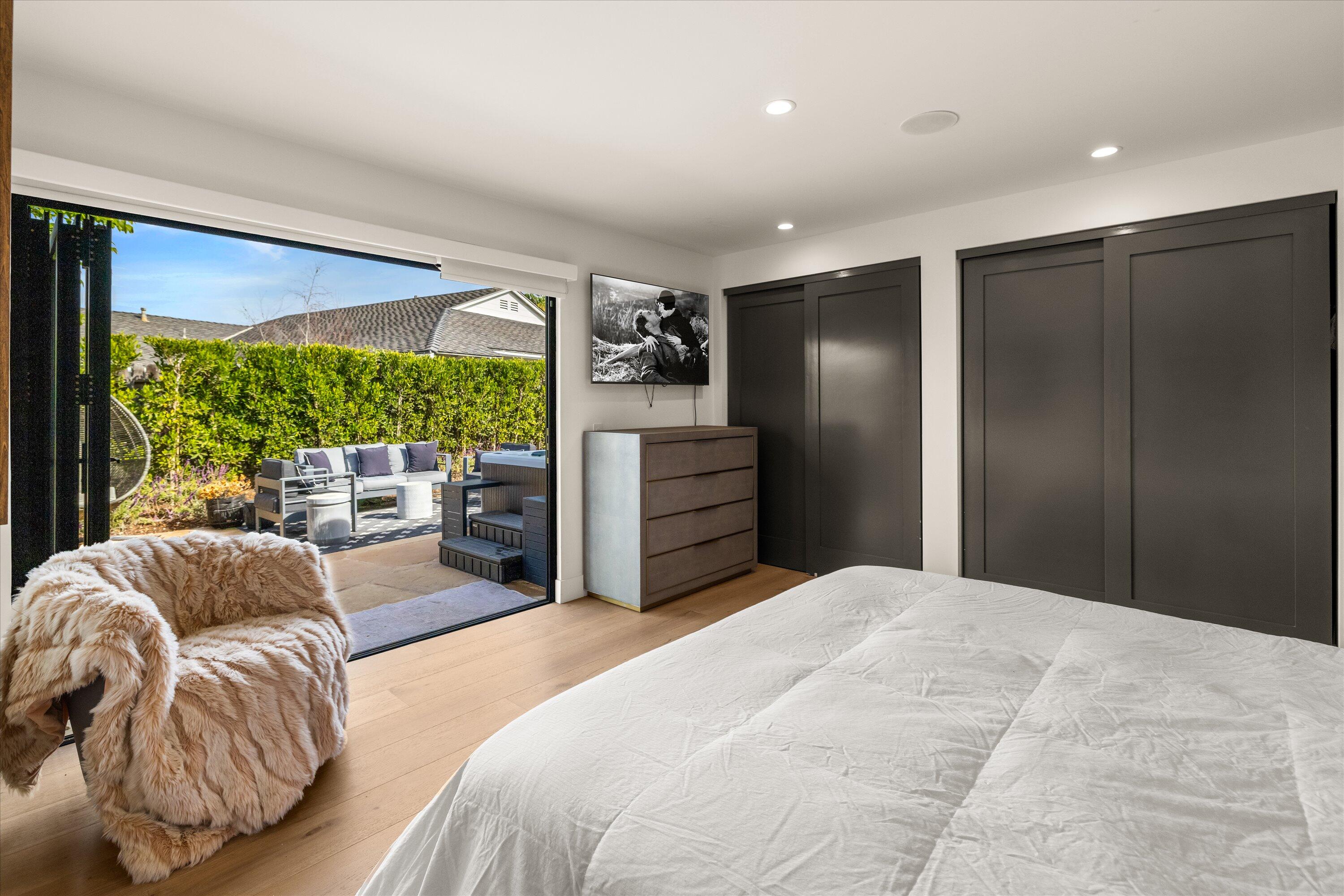 516 Mills Way Goleta, CA 93117 - Photo 18 of 38 a bedroom with a bed and a large window