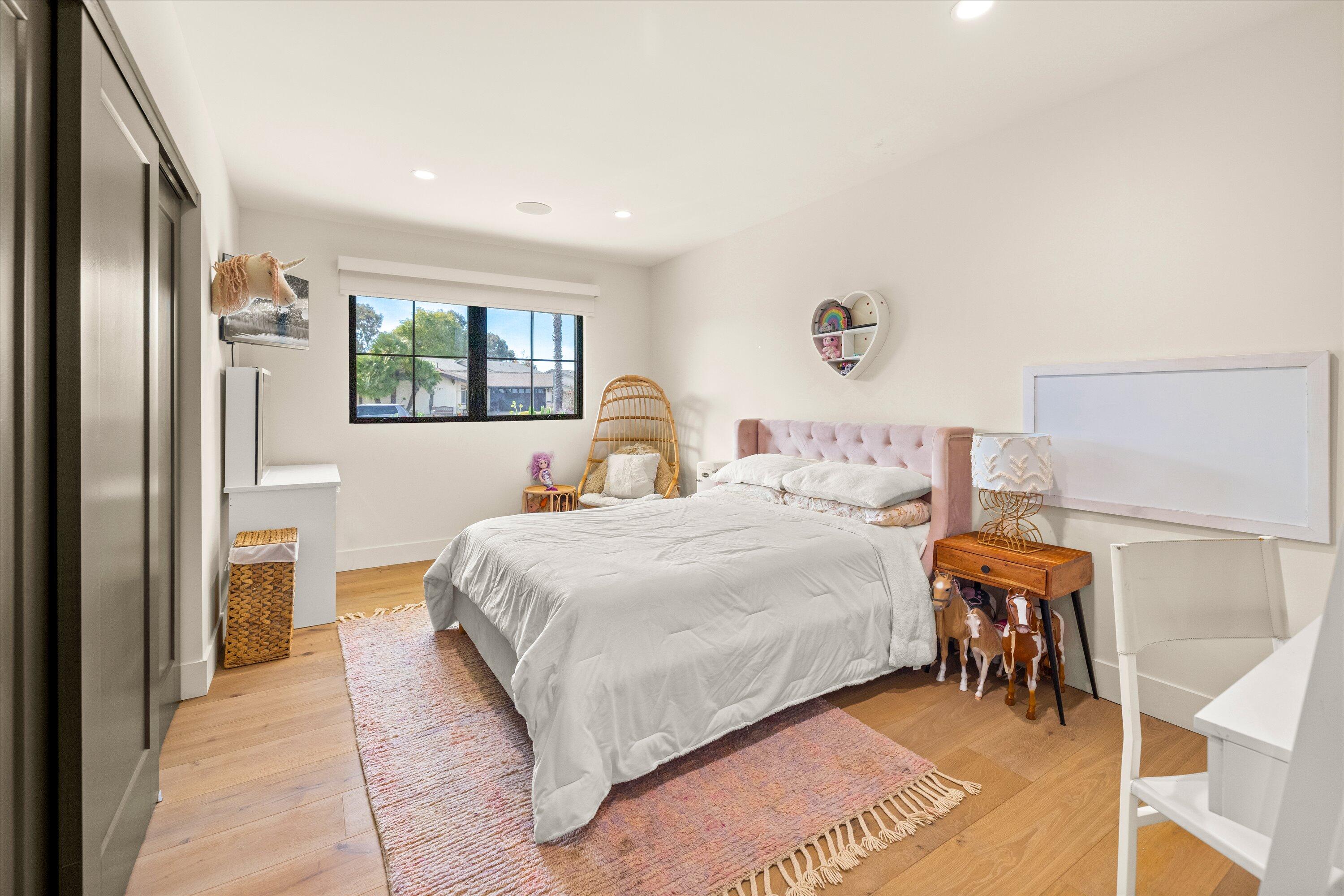 516 Mills Way Goleta, CA 93117 - Photo 26 of 38 a bedroom with a large bed and a window