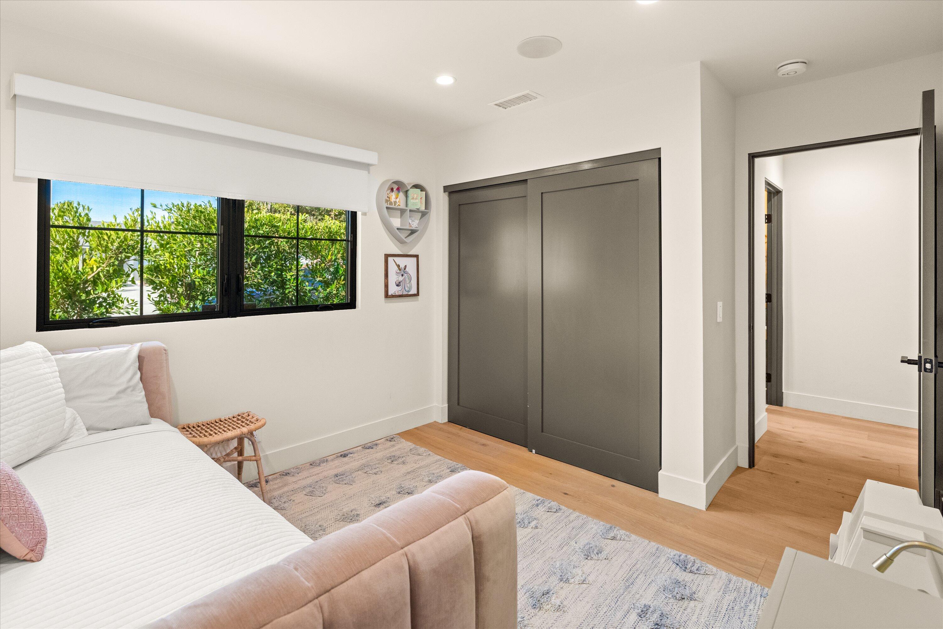516 Mills Way Goleta, CA 93117 - Photo 29 of 38 a bedroom with a bed and a window with chair