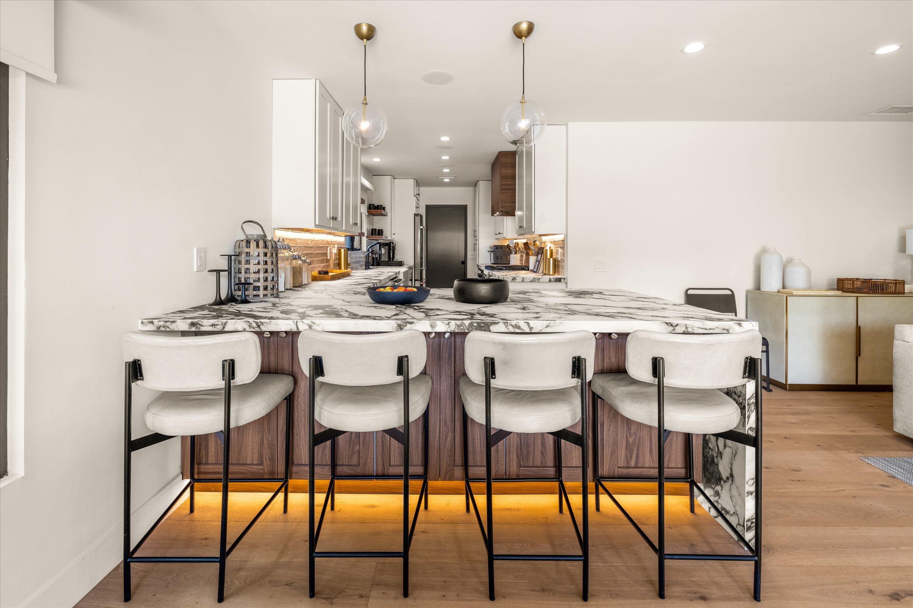516 Mills Way Goleta, CA 93117 - Photo 9 of 38 a view of dining table chairs and wooden floor