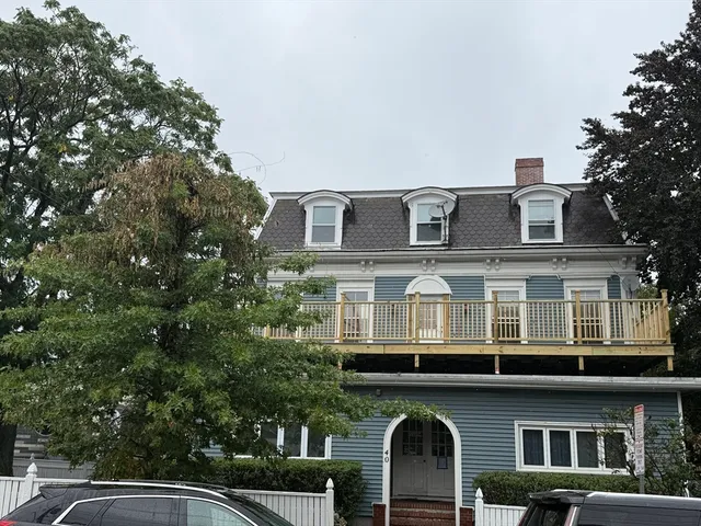 a view of a house with a park