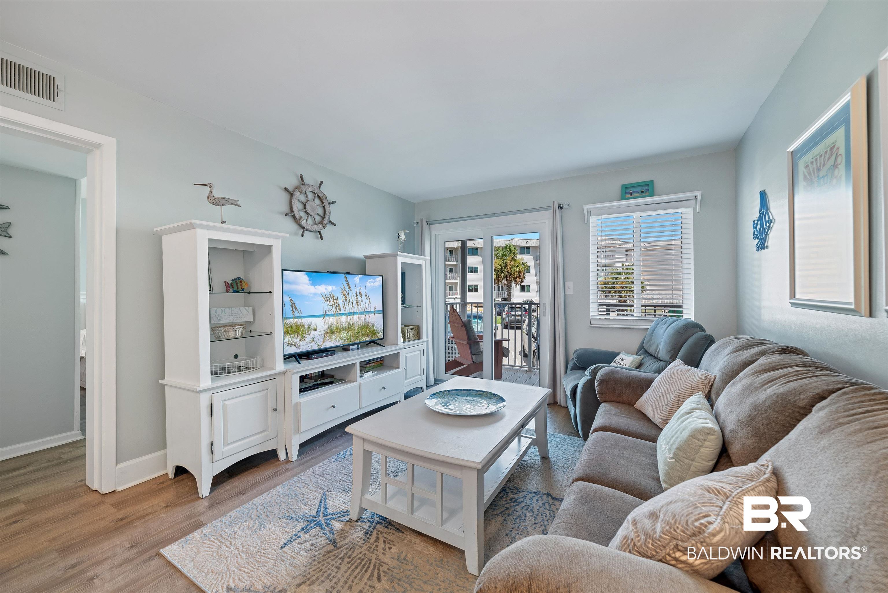 400 Plantation Road, Unit 2123 Gulf Shores, AL 36542 - Photo 10 of 44 Living room featuring light hardwood / wood-style flooring