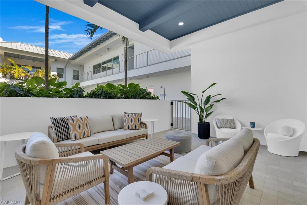 201 8th Street South, Unit 209 Naples, FL 34102 - Photo 22 of 41 a outdoor living with furniture