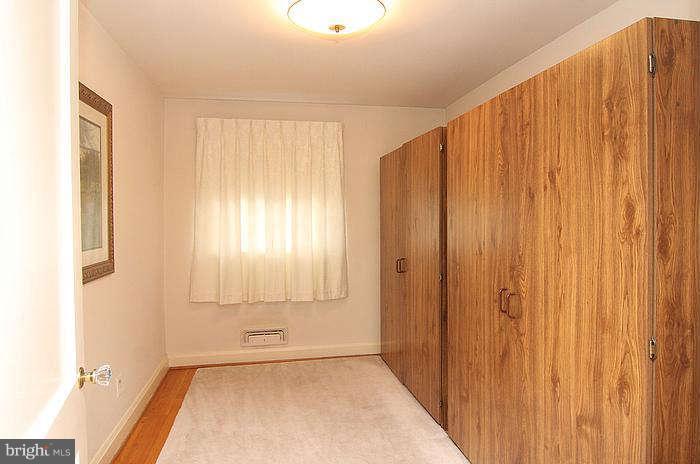 1227 Newfield Road Baltimore, MD 21207 - Photo 9 of 16 a view of an empty room with a window