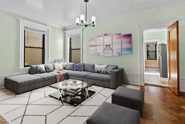 a bed room with a bed mirror and window